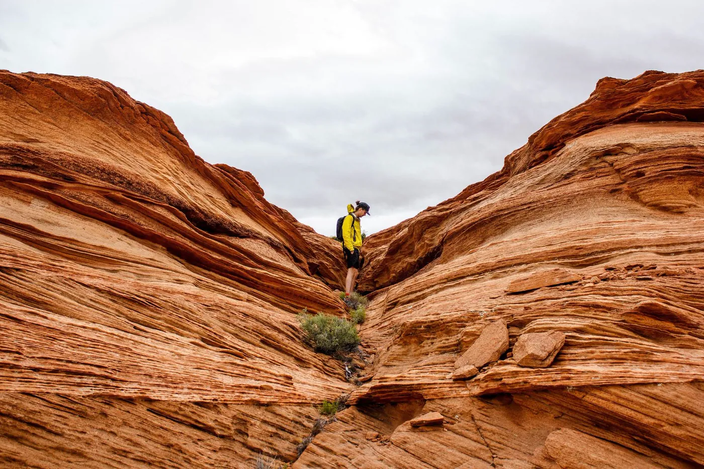 A canyon photo with a hiker, before